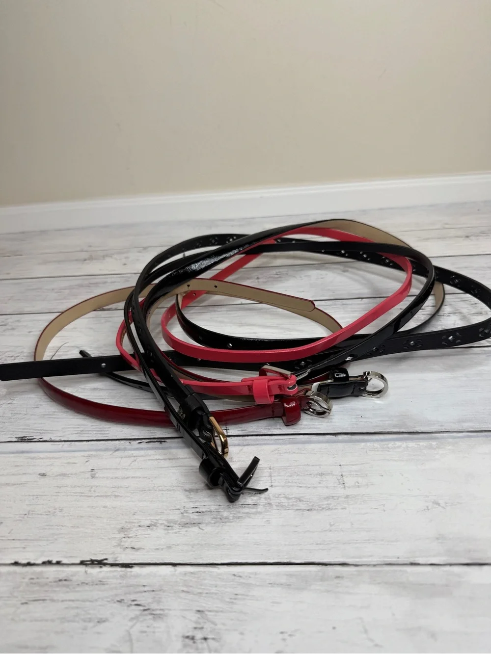 Bundle of five thin belts size Large